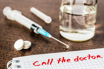 Call the doctor, medicine flows from the syringe and spread out