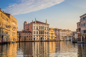 Fototapeta na wymiar Venice cityscape in the morning - buildings along water canal