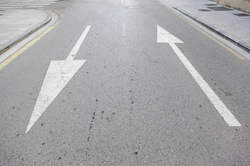 Direction arrows on asphalt
