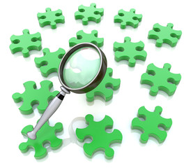 Magnifying glass on the green puzzle