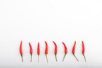 Chili peppers on a white background.