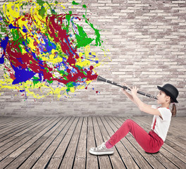 little girl playing clarinet