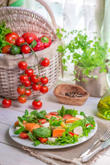 Ingredients for salad with salmon and vegetables