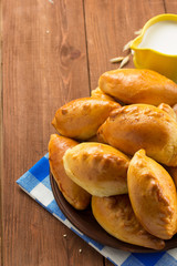 tasty pastry on plate at wood