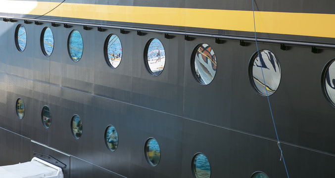 Dream vacation: reflections in cruise ship windows
