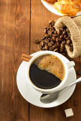 cup of coffee on wood