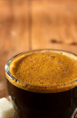 cup of coffee on wood