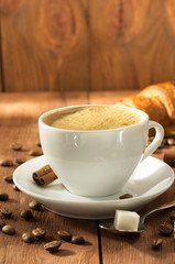cup of coffee on wood