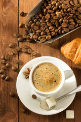 cup of coffee on wood