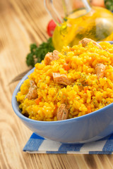 bowl full of rice on wood