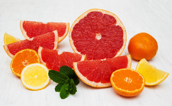 Fresh citrus fruits with green mint