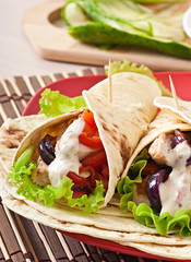 Tortilla with chicken and bell peppers