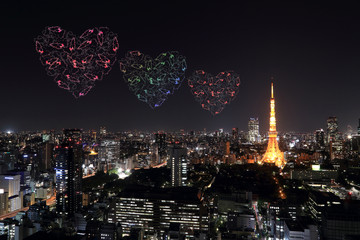 heart sparkle Fireworks celebrating over Tokyo cityscape at nigh