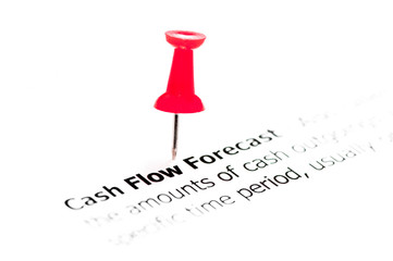 Closeup shot over words Cash Flow Forecast on paper