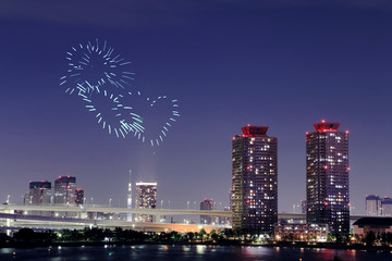 heart sparkle Fireworks celebrating over Odaiba, Tokyo cityscape
