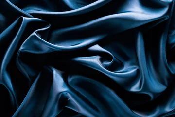 Abstract wave textile texture or background in blue color © nioloxs