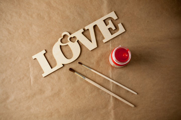 love sign and brushes