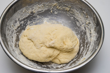 Dough in metal bowl