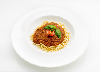 Spaghetti bolognese on white plate