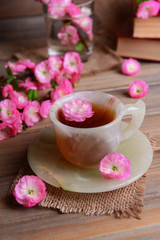 Beautiful fruit blossom with cup of tea