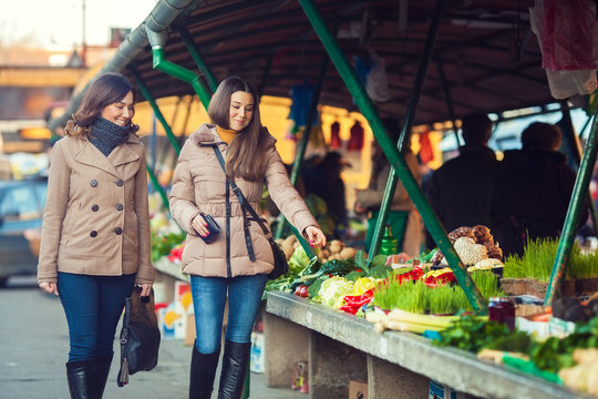 Two young women on farmer's market