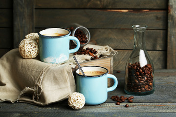 Beautiful composition with tasty cappuccino on wooden table