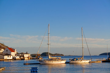 Fototapeta na wymiar Sailing boats, moored to the quay