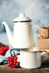 Winter composition with hot beverage on nature background