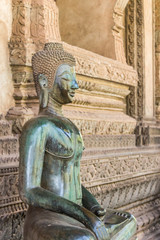 Image of Bronze Buddha statue.