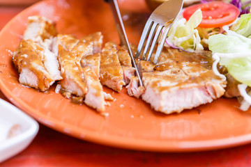 Grilled steaks and vegetable salad