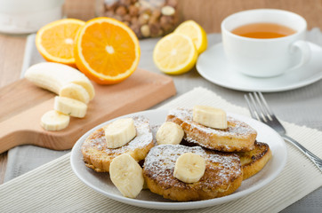 French toast to sweet, with banana sprinkled with sugar