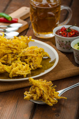 Onion bhajis, czech beer