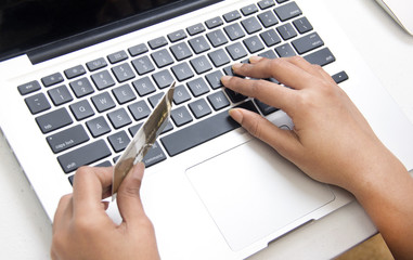 Person making online payments using a credit card