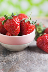 fresh strawberry in small bowl
