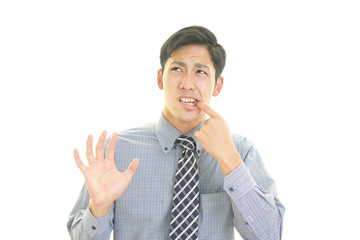 歯痛を訴える男性