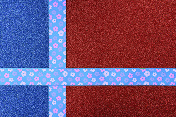 red and blue background with paper tape crosses