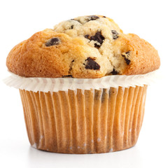 Single light chocolate chip muffin in wax liner on white. - obrazy, fototapety, plakaty