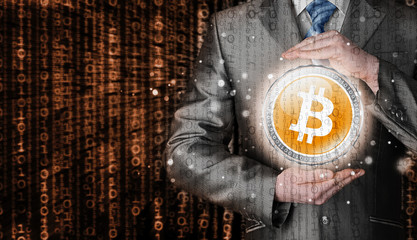 Businessman with protective gesture bitcoins