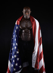 Muscular man with American flag