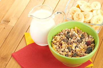 Delicious and healthy cereal in bowl with milk