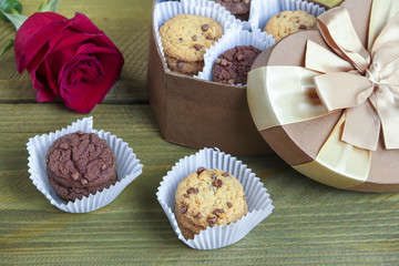biscuits in a gift box on a wooden background