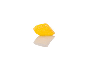 Yellow colored sugar jelly candy over white background