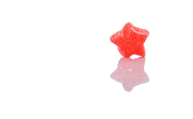 Red sugar jelly candy over white background