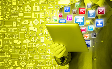 Business man use tablet pc with colorful application icons