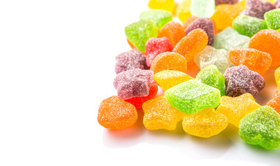 Colorful sugar jelly candy over white background