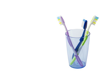 toothbrushes in a glass isolated