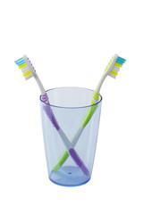 toothbrushes in a glass isolated