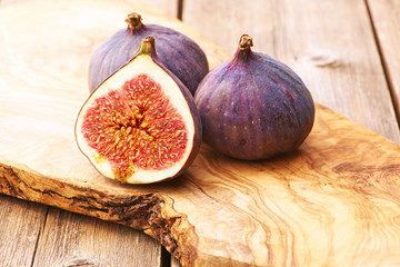 Fresh figs on wooden table