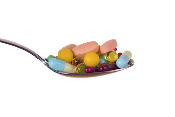 a tablet in a spoon