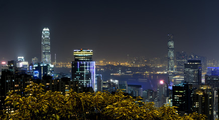 Obraz premium City night scene with business office skyscrapers in Hong Kong,